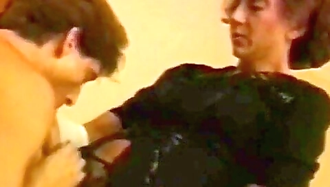 Busty brunette fucks her ass and pussy with a dildo