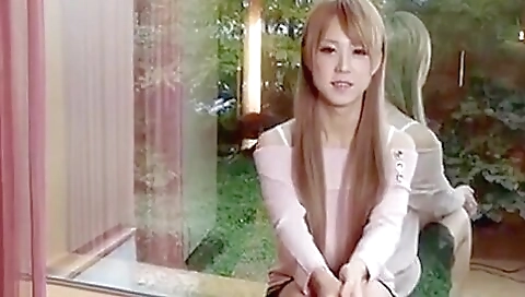 Japanese girl in black bikini jerks off by a black dude